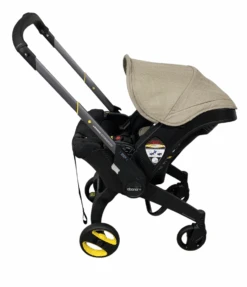 Doona Pottery Barn Kids Exclusive Edition Infant Car Seat Stroller, 2023, Warm Stone -Kindly Baby Shop 73f2f537 eb93 4f57 b449 be4beb042103