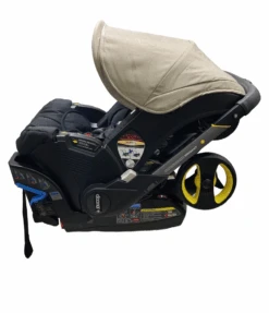 Doona Pottery Barn Kids Exclusive Edition Infant Car Seat Stroller, 2023, Warm Stone -Kindly Baby Shop 930f7956 0ef6 4cbc 8d01 2a6d7d7e2295