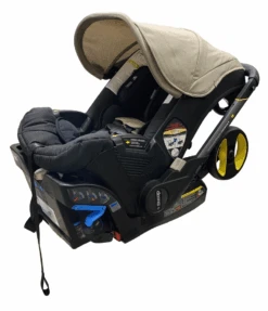 Doona Pottery Barn Kids Exclusive Edition Infant Car Seat Stroller, 2023, Warm Stone -Kindly Baby Shop a62e99db 71b8 4f7d 82d2 909301b3387e